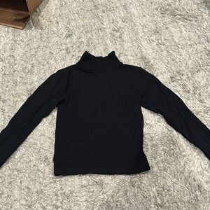Black tight cropped turtle neck